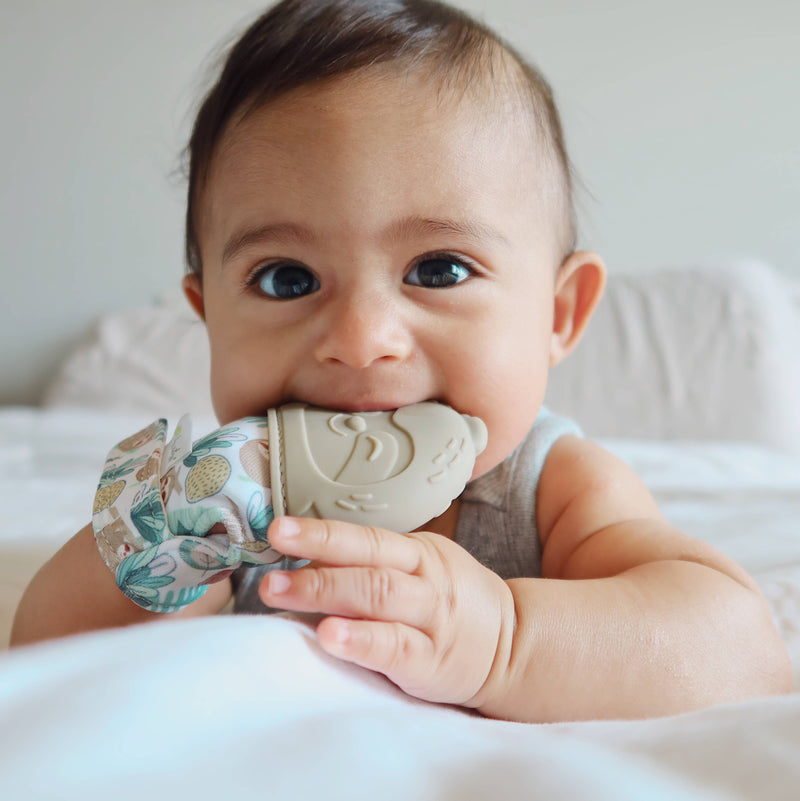 Itzy Mitt™ Silicone Teething Mitts: Bow