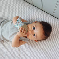 Itzy Mitt™ Silicone Teething Mitts: Bow