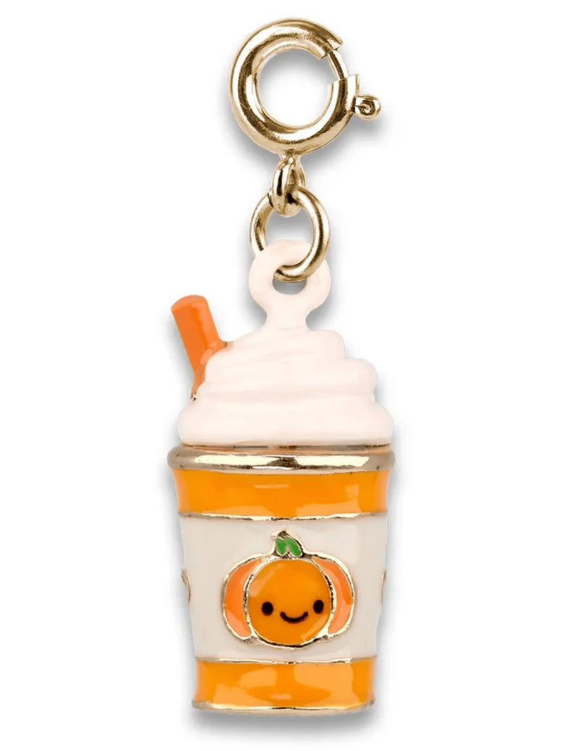 A pumpkin-themed iced coffee charm with a gold clasp, featuring a white and orange cup with a smiling pumpkin face, white whipped cream, and an orange straw, set against a plain white background.